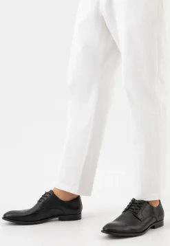 Czarne eleganckie buty męskie ze skóry licowej